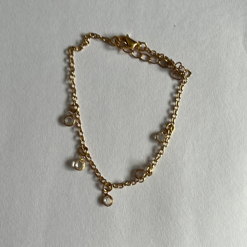 gold bracelet with crystals